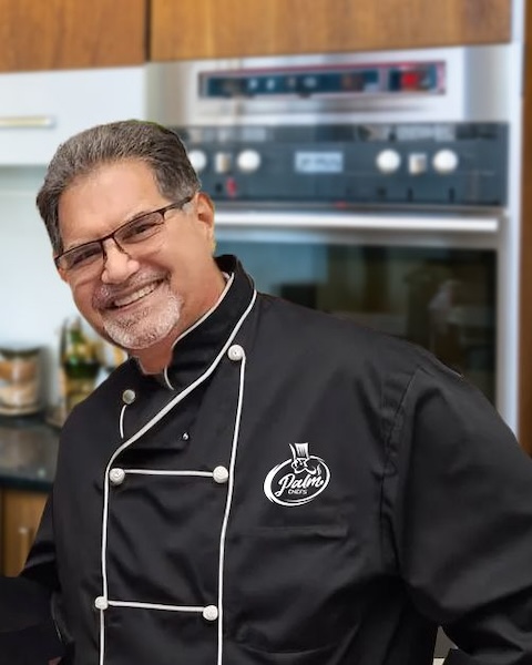 Headshot photo of Chef Robert Benezra